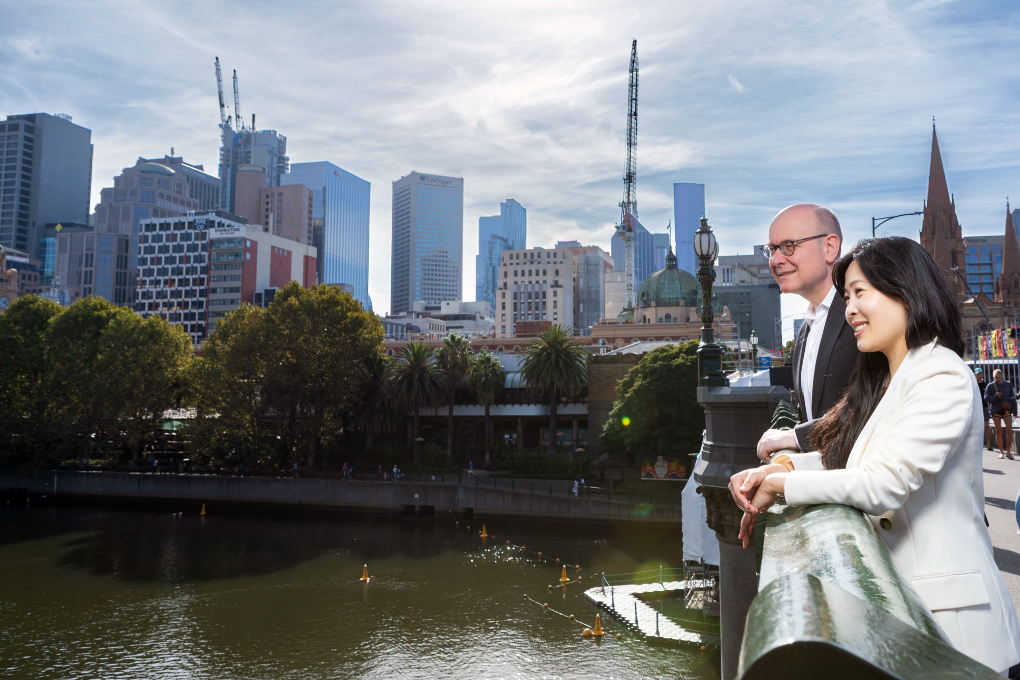 Riverside portrait with the city behind