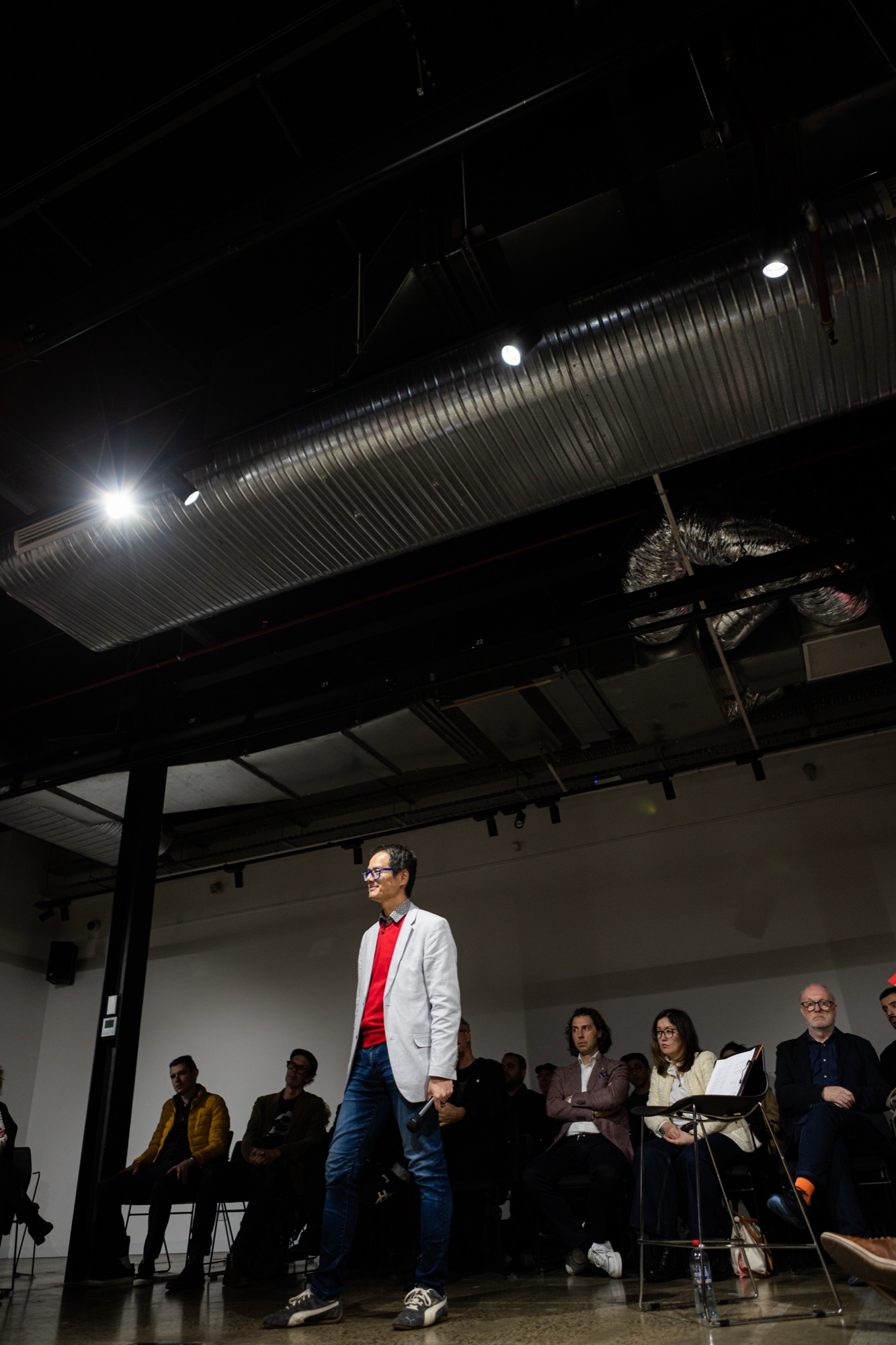Speaker under stage lighting