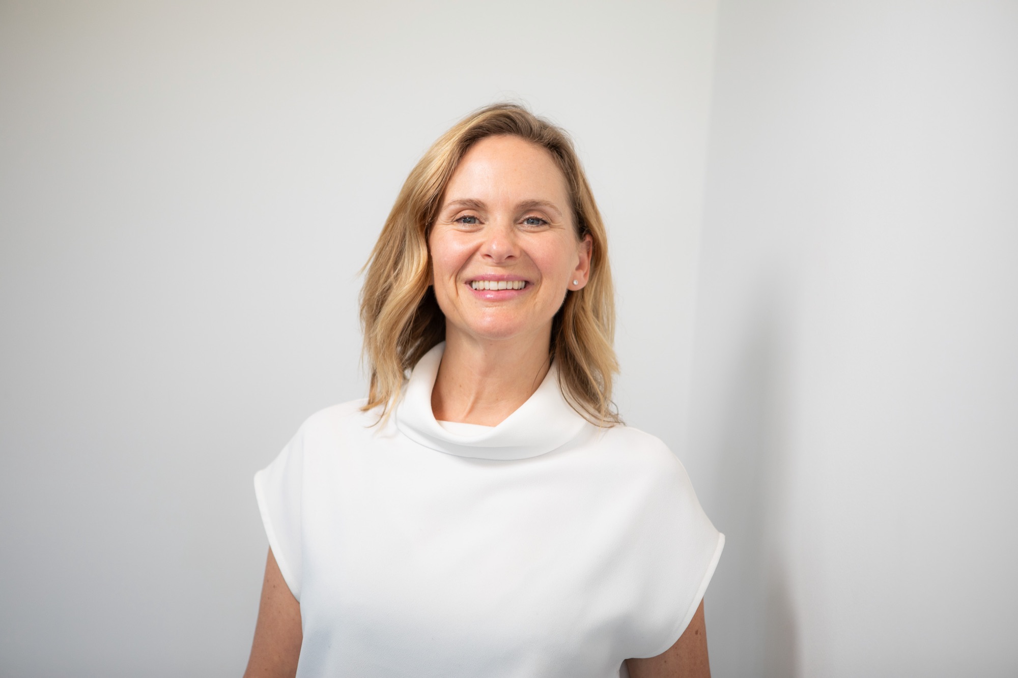 Studio headshot on a white background