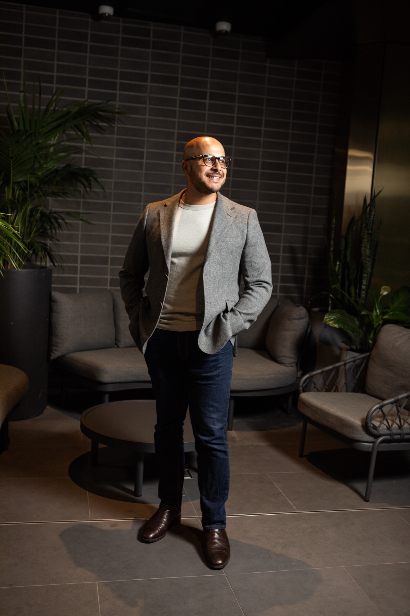 Full-length business portrait in a lounge