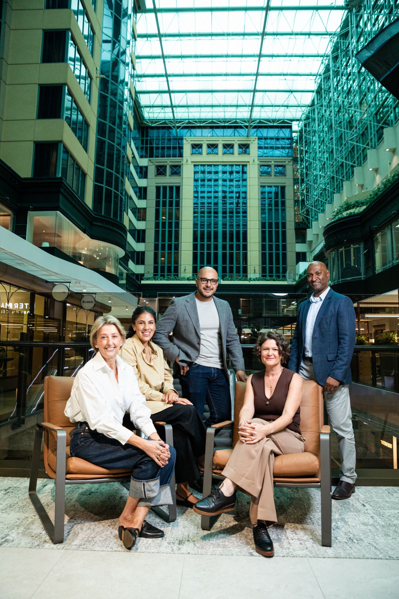 Team portrait in a building atrium