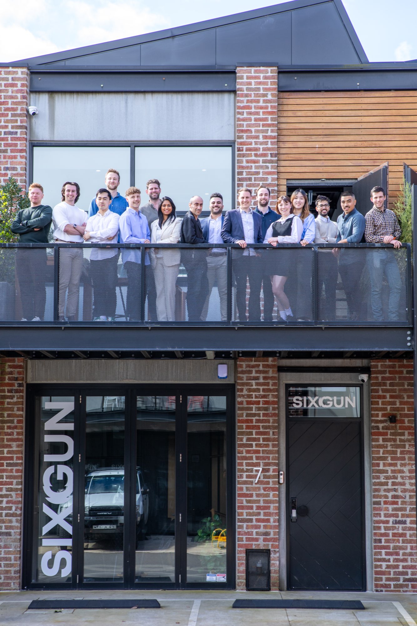 Team portrait on the office balcony