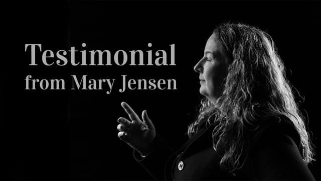 Mary Jensen speaking to camera about her portrait session